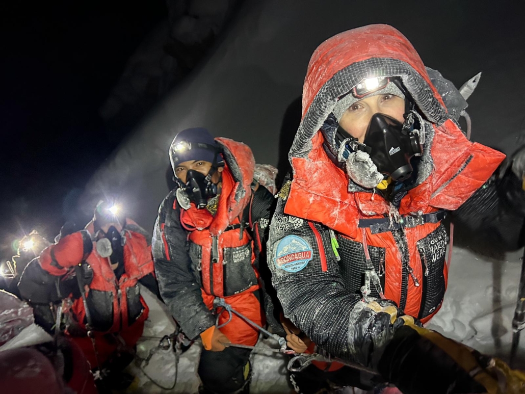 Our climbers, James and Sara, with Ming Dorchi Sherpa at the summit of Manaslu! (Photo by Terray Sylvester)