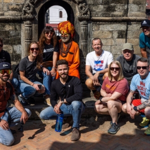 Members of our Fall Khumbu Valley programs pose for a team photo with a sadhu (Hindu holy man) at Pashupatinath Temple in Kathmandu. (Photo by Terray Sylvester)