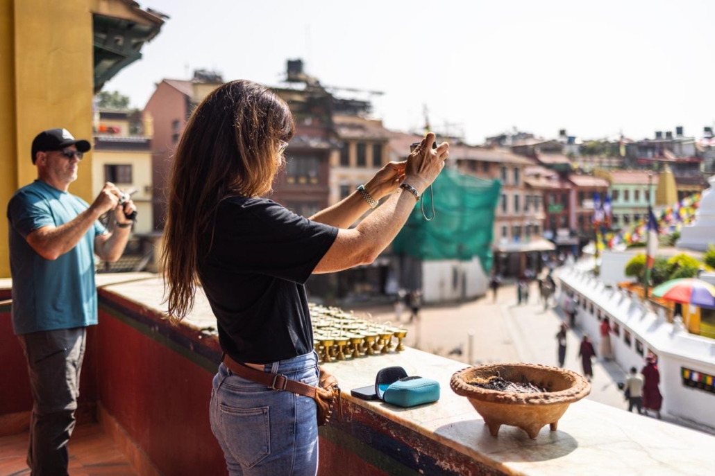 Members of the team snapping photographs at Boudha Stupa. (Photo by Terray Sylvester)