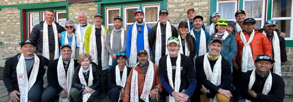 The team departing Namche Bazaar after receiving a blessing from our friends at the Panorama Lodge.