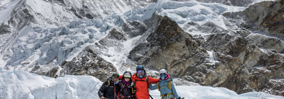 The team together earlier in the expedition with Makalu behind (photo by Terray Sylvester)