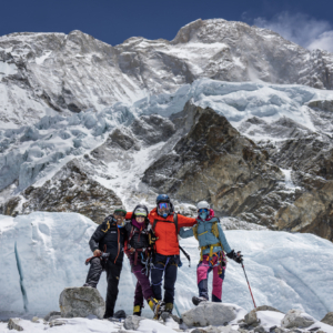 The team together earlier in the expedition with Makalu behind (photo by Terray Sylvester)