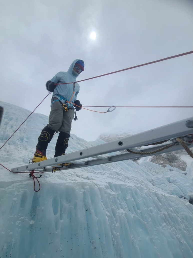 Practicing ladder crossing near our base camp (photo by Conan Bliss)