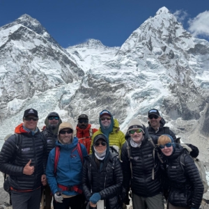 The team together on an acclimatization hike above Everest Base Camp with Everest, Lhotse, and Nuptse behind.