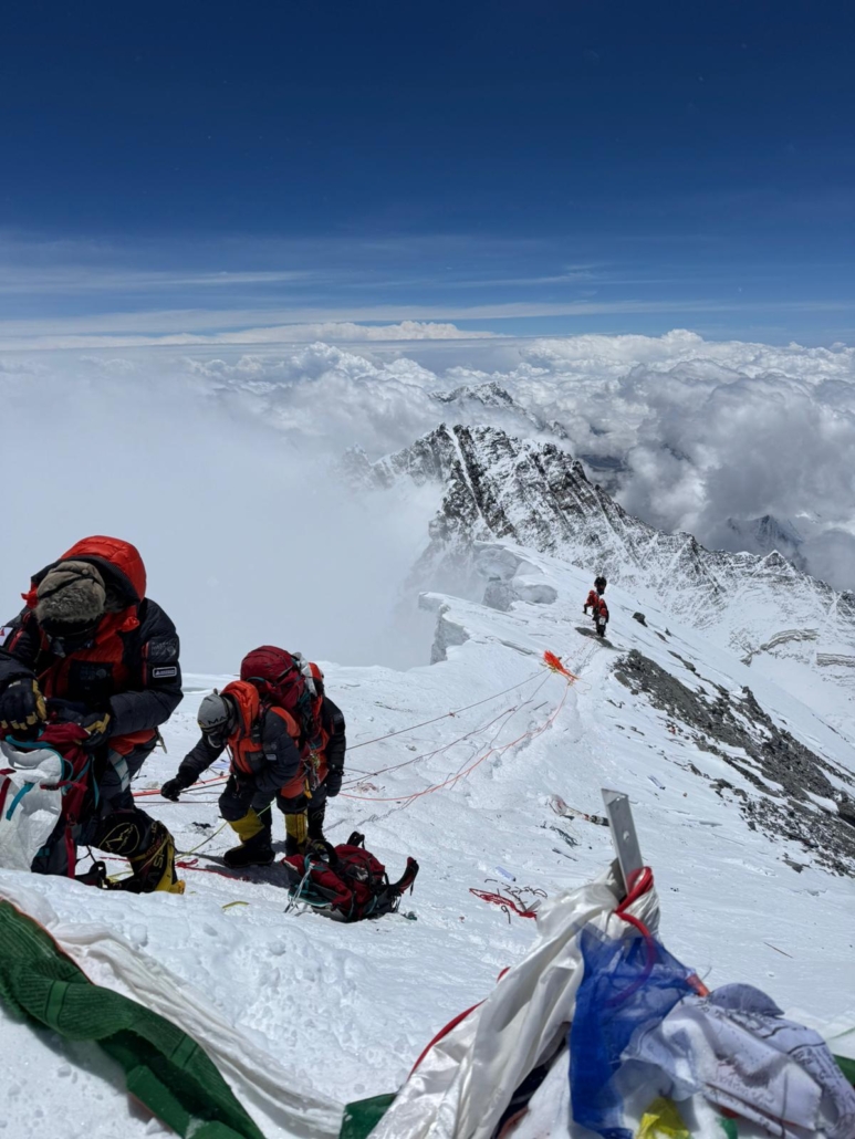 Climbing up the Mount Everest's Southwest Ridge to the summit.
