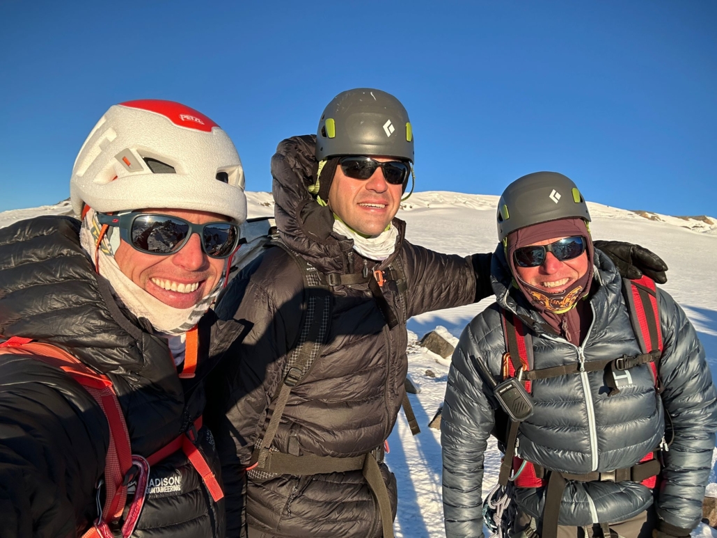 Guide Terray Sylvester on the summit with Ed Viesturs and our climber, Jared!