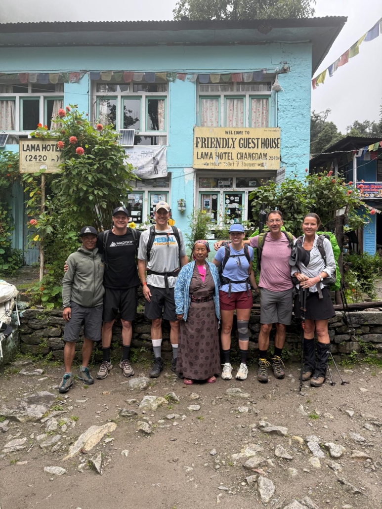 The team together outside one of the guesthouses that fill the valley.