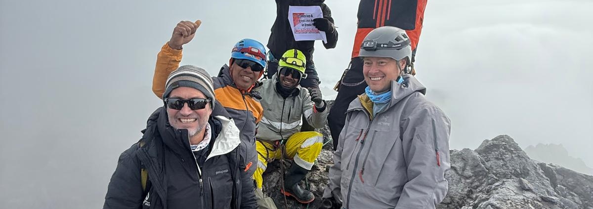 The final Madison Mountaineering team on the summit of Carstensz Pyramid!