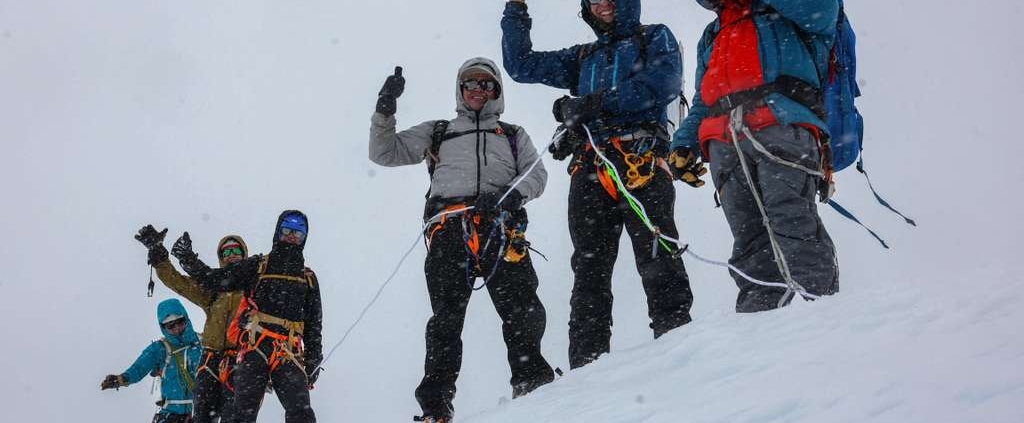 Our climbers Rick, Marco, Karl and Bill leaving the summit of Lobuche East with climbing Sherpas Aang Phurba Sherpa and Kam Dorji Sherpa (photo by Terray Sylvester)