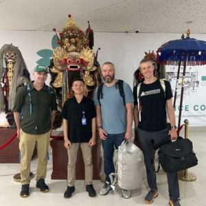 The team together in Bali awaiting their flight to Timika.