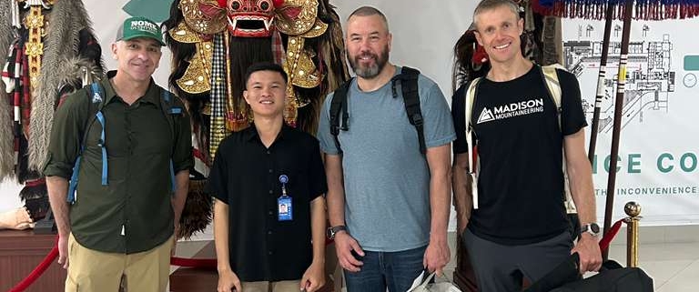The team together in Bali awaiting their flight to Timika.