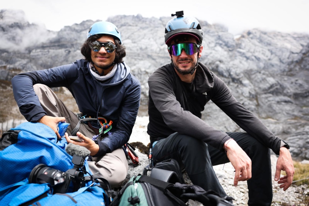 Our climbers, Raj and Louis, relaxing on the First Terrace, partway up the standard Heinrich Harrer route on Carstensz Pyramid (photo by Terray Sylvester)