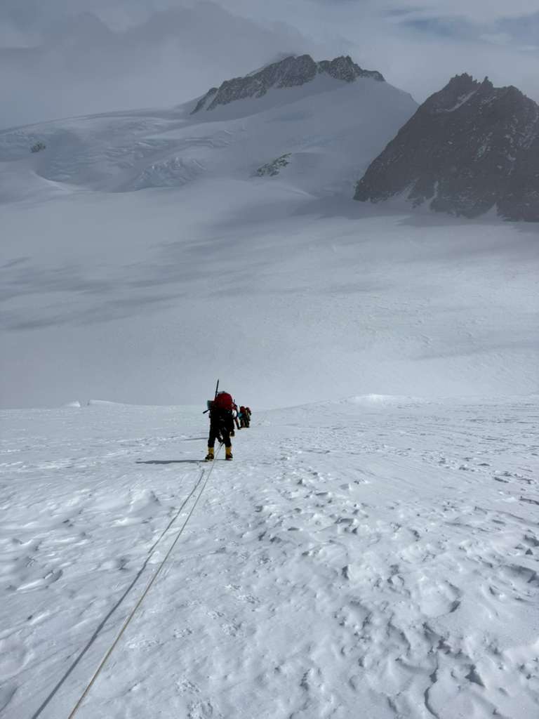 The team ascending fixed-lines between low camp and high camp.