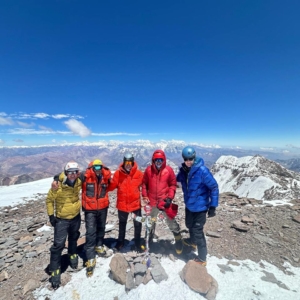 On the summit of Aconcagua with blue skies over head!