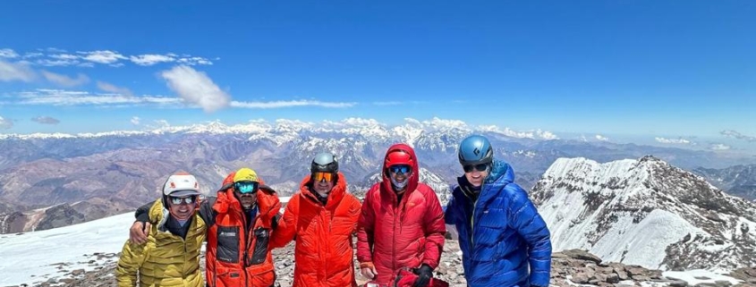 On the summit of Aconcagua with blue skies over head!