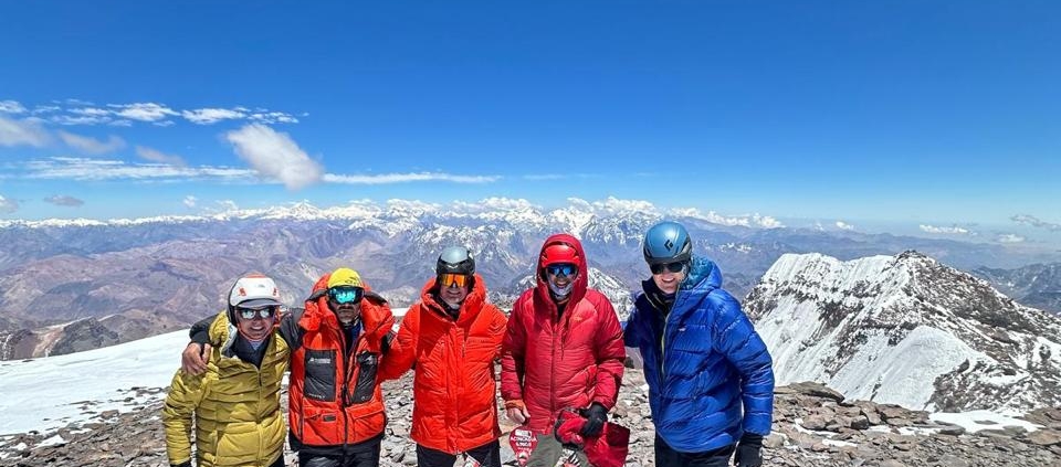 On the summit of Aconcagua with blue skies over head!