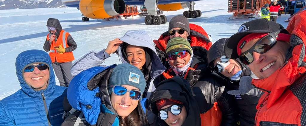 The team after landing on the blue ice runway in Union Glacier Camp