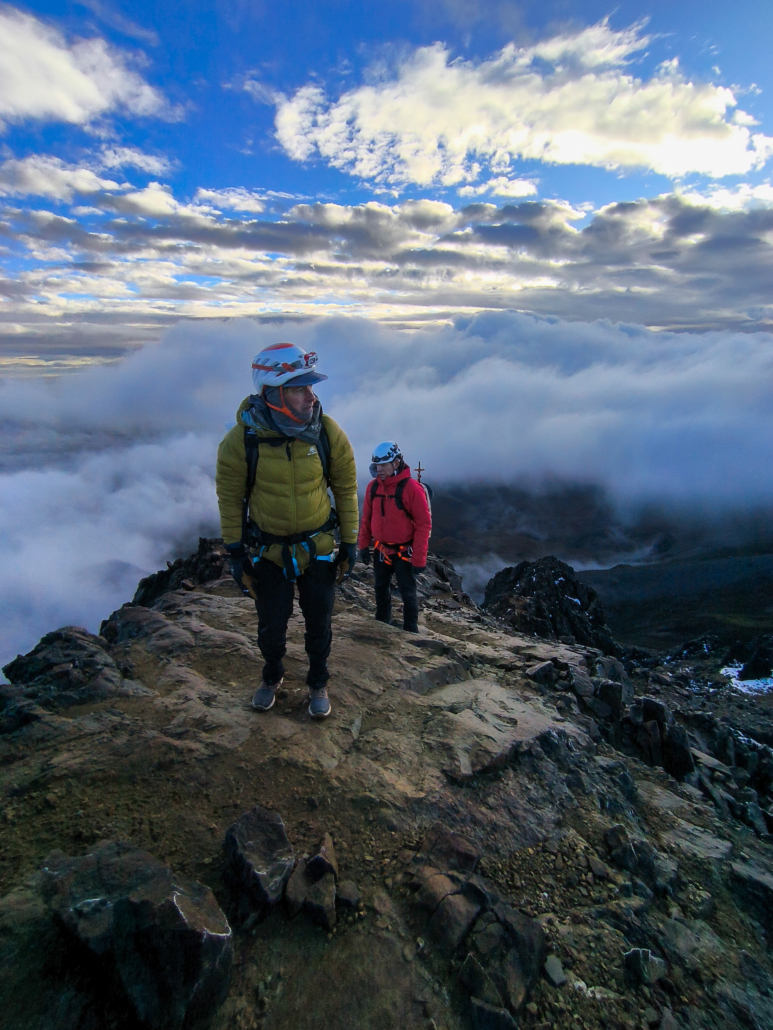 The team climbing above the clouds on a beautiful morning in Ecuador!