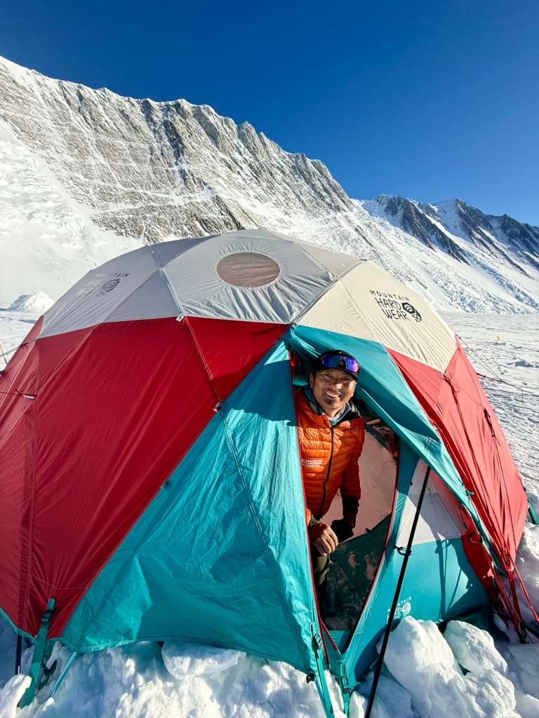 Guide, Aang Phurba Sherpa posing for a quick photograph in the team dining tent