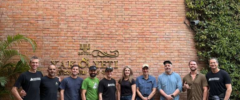 Team photo in front of the Yak and Yeti Hotel.