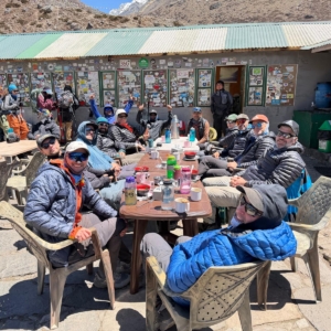 Enjoying the sunshine while stopping for a break on the trail to Lobuche village.