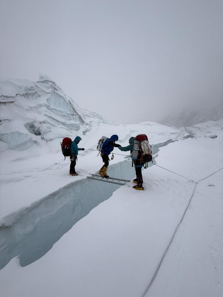 Crossing a crevasse in the icefall