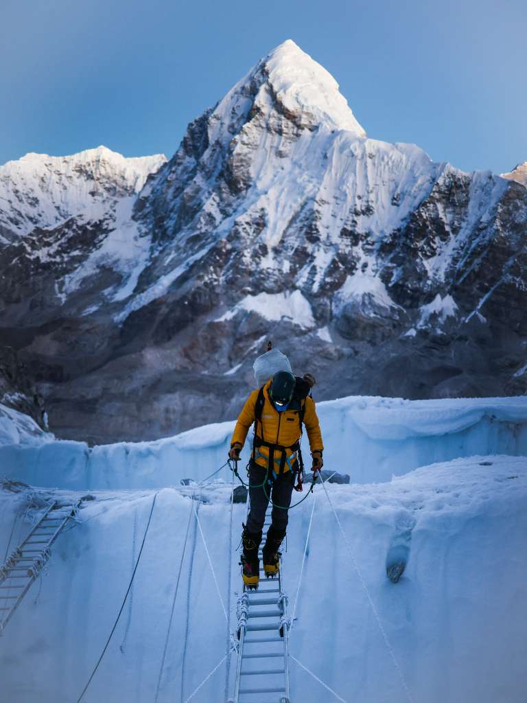 Climbing through the Khumbu Icefall with Pumori behind.
