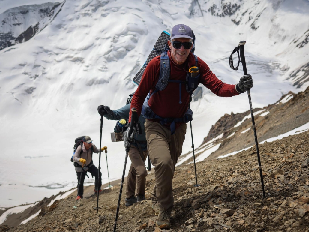 Our climber, Bruce, approaching the top of Yukhin Peak (photo by Terray Sylvester)