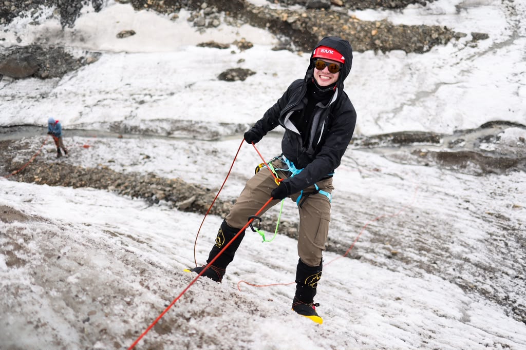 Our climber, Chris, rappelling. (Photo by Terray Sylvester)