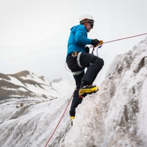 Bruce, one of our Lenin Peak climbers, practicing fixed line ascent skills. (Photo by Terray Sylvester)