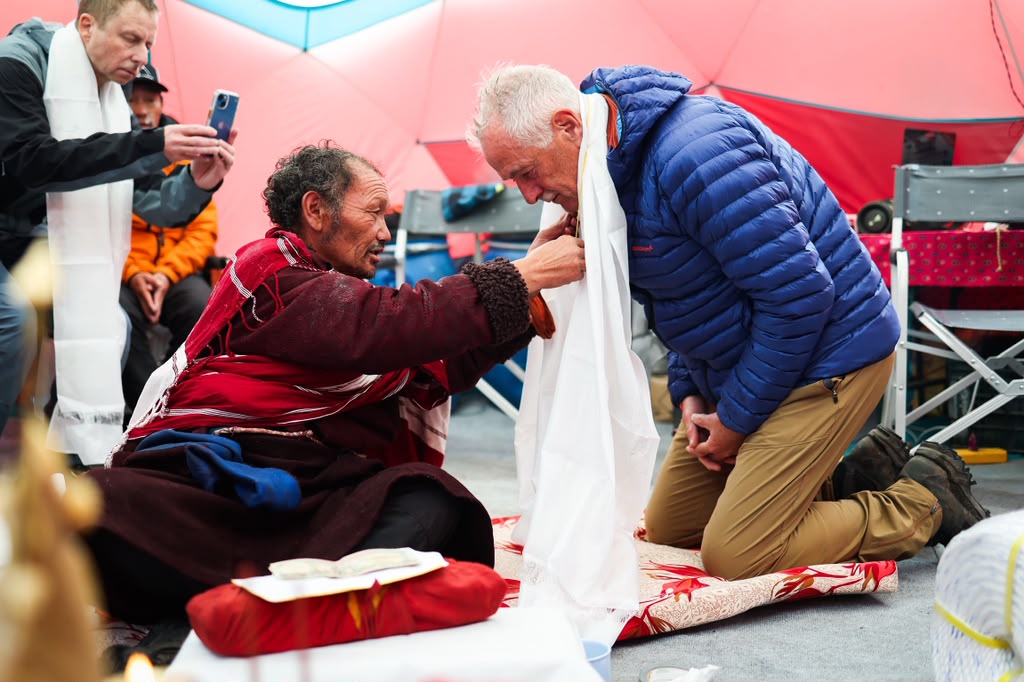 Our climber, Myles, receiving a blessing during the puja (photo by Terray Sylvester)
