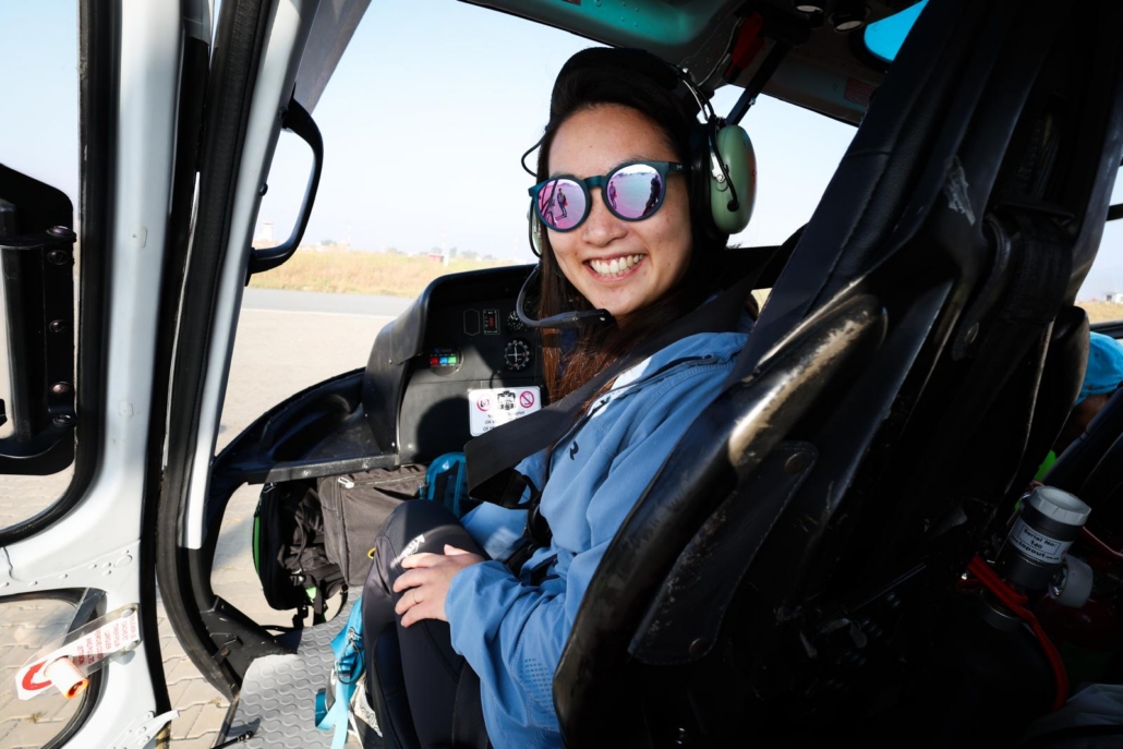 Our climber, Naomi, just before lifting off from Kathmandu. (Photo by Terray Sylvester)