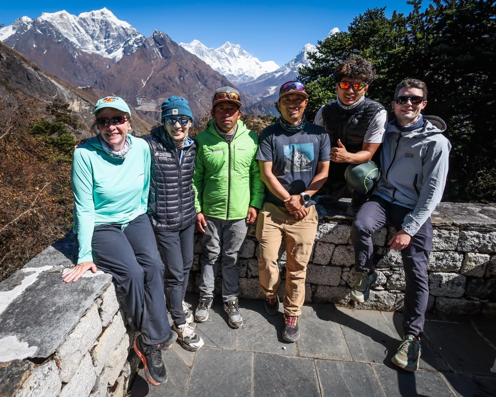 The team at the Everest View Hotel with views of Everest, Lhotse and Nuptse (photo by Terray Sylvester)